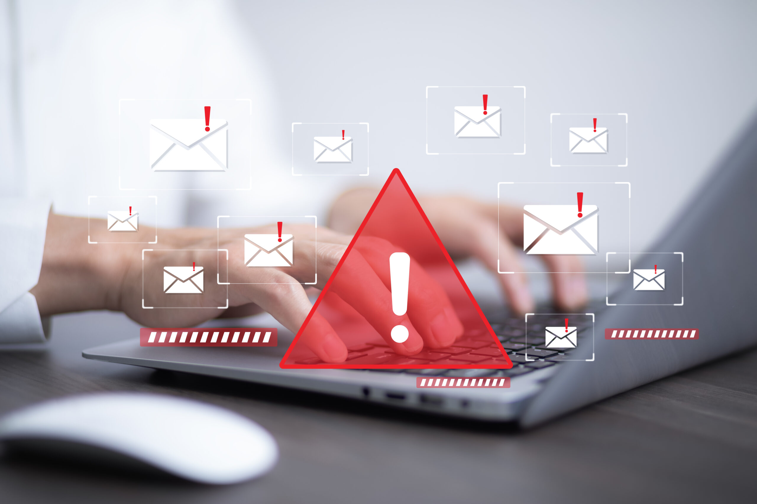 筆電畫面顯示多封帶有警示符號的電子郵件，象徵可疑中獎通知與釣魚詐騙風險。